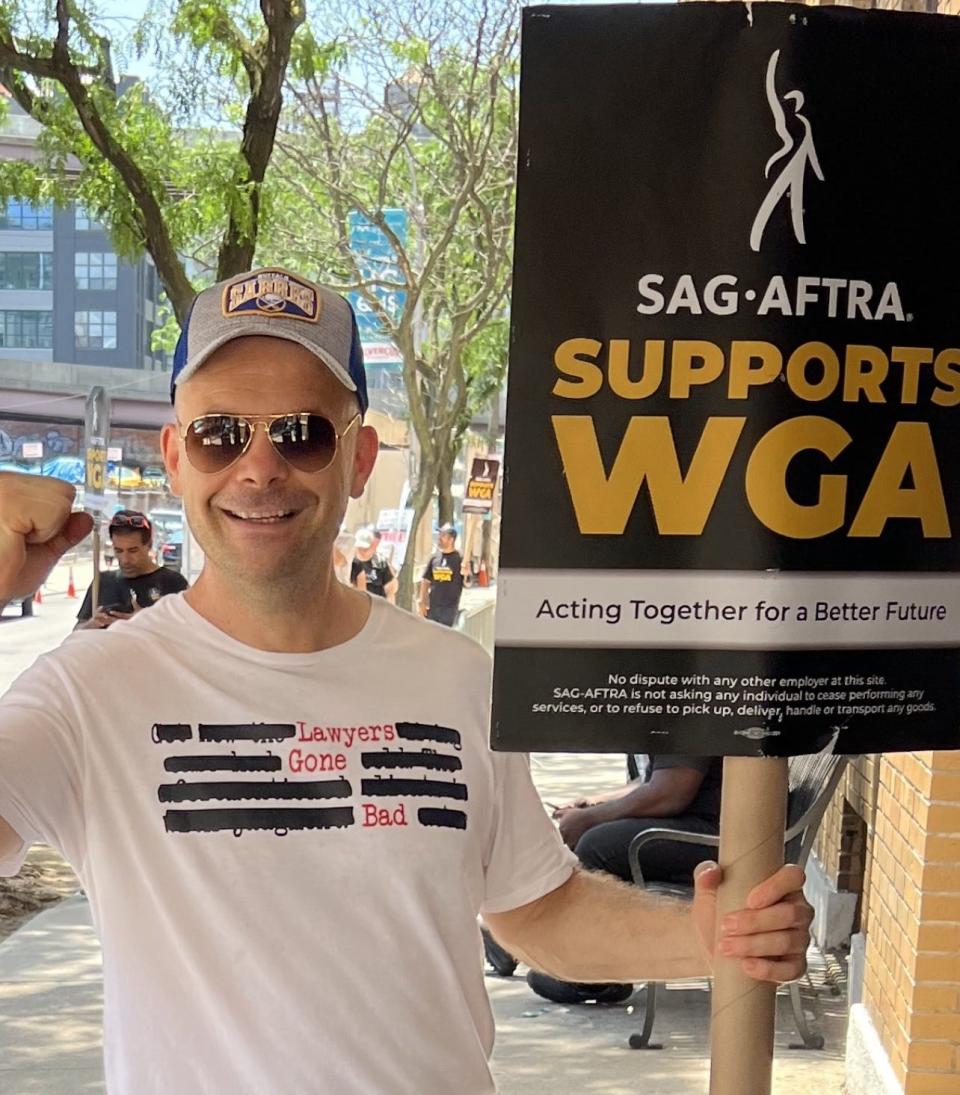 Actor Tom Paolino, a Brown grad and cousin of Providence's former mayor, walks the picket line during the ongoing SAG-AFTRA strike in Hollywood.