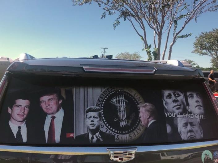 A Cadillac SUV with a nod to the QAnon movement. (Eric Garcia/The Independent)