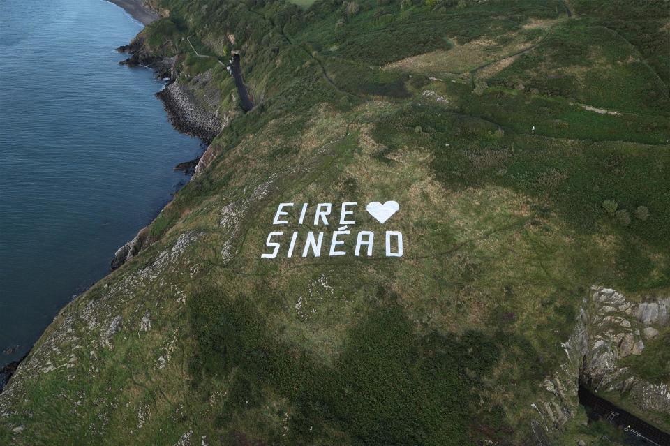 A giant installation created by Dublin-based marketing agency The Tenth Man honoring the late   Sinéad O'Connor is seen off the coast of Bray. August, 6th 2023.  / Credit: The Tenth Man