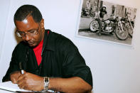 <p>Shabazz is celebrated for documenting everyday life, evolving cultures and social conditions in N.Y.C. since first picking up a camera in 1975.</p> <p>Here, he's seen signing autographs during his 2005 exhibit.</p>