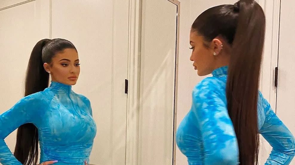Kylie Jenner poses in front of a mirror