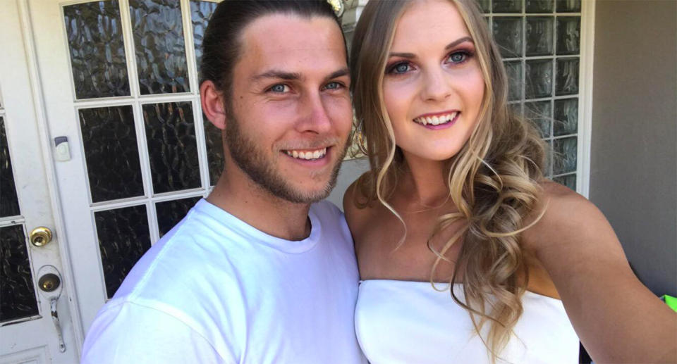 Brandon Orr poses for a photo with his fiancee, Chantelle Baxter.
