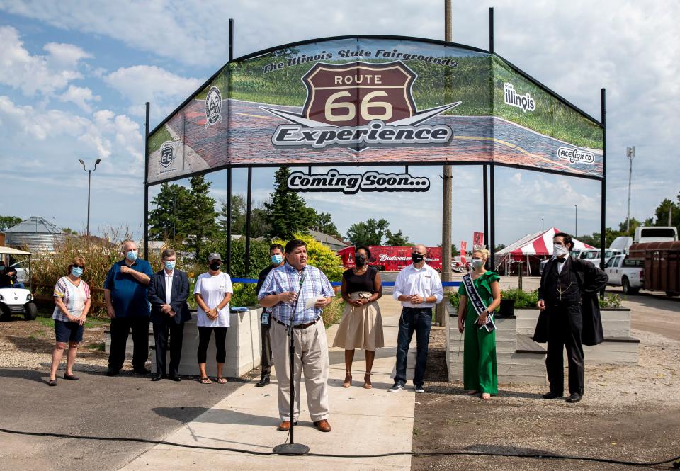 Illinois Gov. JB Pritzker delivers his remarks during the ribbon cutting ceremony for the Route 66 Experience during the 2021 Illinois State Fair at the Illinois State Fairgrounds in Springfield, Ill., Friday, August 13, 2021. The Route 66 Experience is a multiyear project focusing on the iconic road that will culminate in the  centennial celebration in 2026. [Justin L. Fowler/The State Journal-Register] 