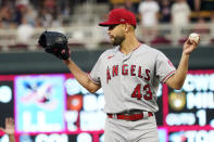 Los Angeles Angels pitcher Patrick Sandoval reacts after giving up a double to Minnesota Twins' Brent Rooker, spoiling his no-hitter, in the ninth inning of a baseball game, Saturday, July 24, 2021, in Minneapolis. (AP Photo/Jim Mone)