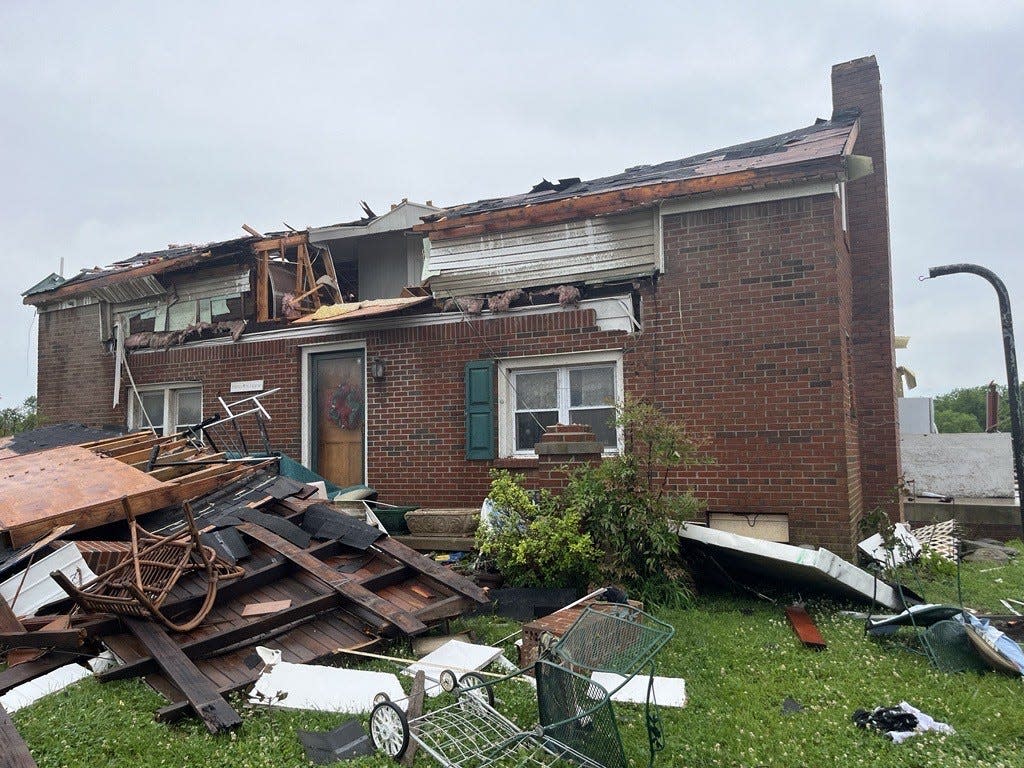 A home off Cothran Road overlooking Bear Creek was damaged by a likely tornado Wednesday, May 8, 2024. Tammy Johnson, 66, had lived in the home for most of her life and was on the scene with her dog Max the day after Thursday, May 9, 2024.