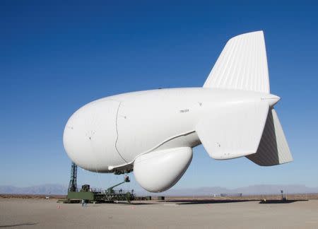 A Raytheon Joint Land Attack Cruise Missile Defense Elevated Netted Sensor System (JLENS) aerostat is pictured on the White Sands Missile Range, New Mexico, in this February 22, 2012 photo file photo. REUTERS/John Hamilton/DVIDS/Handout/Files