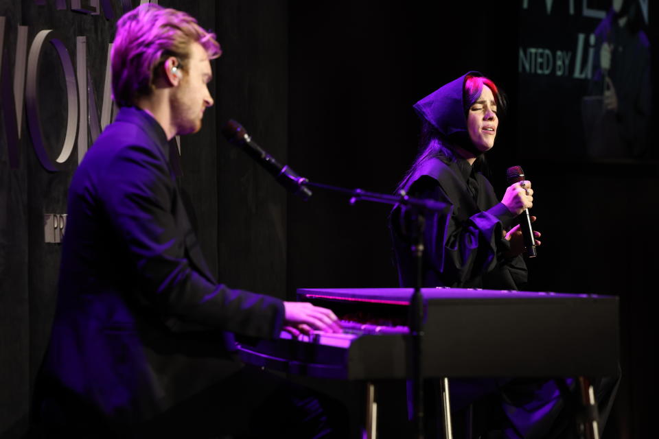 LOS ANGELES, CALIFORNIA - NOVEMBER 16: (L-R) Finneas O'Connell and Honoree Billie Eilish perform during Variety Power of Women Los Angeles presented by Lifetime at Mother Wolf on November 16, 2023 in Los Angeles, California. (Photo by Monica Schipper/Variety via Getty Images)