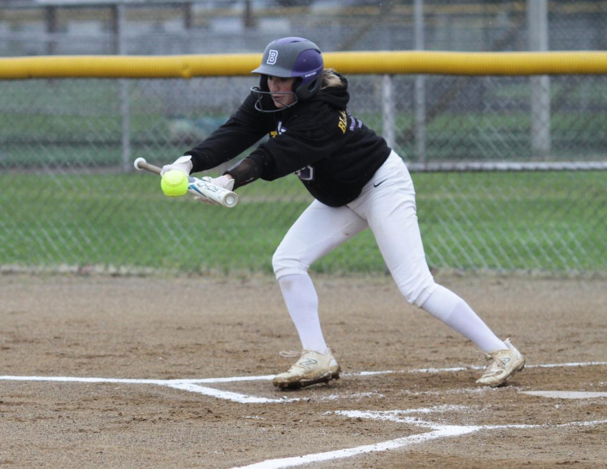 Ciara Blankenship gets a bunt down for a base hit against Maple Valley on Tuesday.