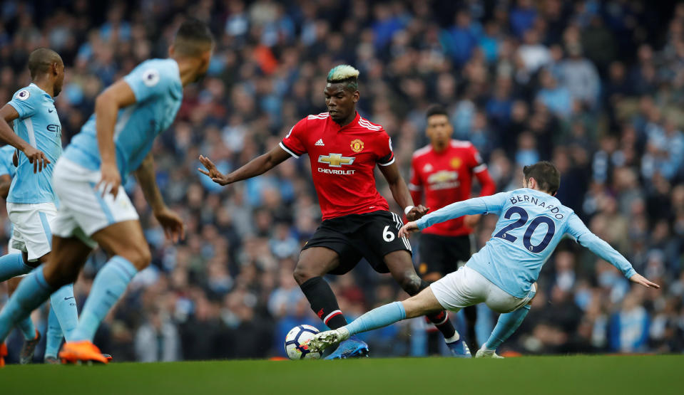 <p>Paul Pogba sends Manchester City’s Bernardo Silva the wrong way </p>