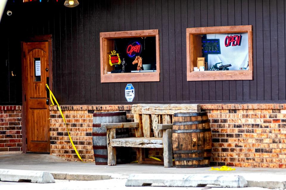 Oklahoma City Police investigate the scene at Whiskey Barrel Saloon in Oklahoma City, Okla. on Sunday, April 2, 2023, after a shooting Saturday evening  killed at least three people.