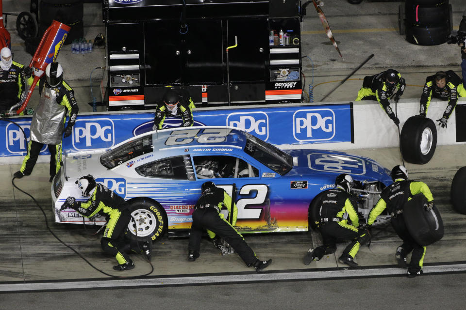 Austin Cindric makes a pit stop during the NASCAR Xfinity Series road course auto race at Daytona International Speedway, Saturday, Feb. 20, 2021, in Daytona Beach, Fla. (AP Photo/Terry Renna)