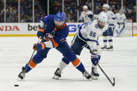 New York Islanders defenseman Adam Pelech (3) controls the puck against Tampa Bay Lightning right wing Nikita Kucherov (86) during the third period of Game 3 of the NHL hockey Stanley Cup semifinals, Thursday, June 17, 2021, in Uniondale, N.Y. (AP Photo/Frank Franklin II)