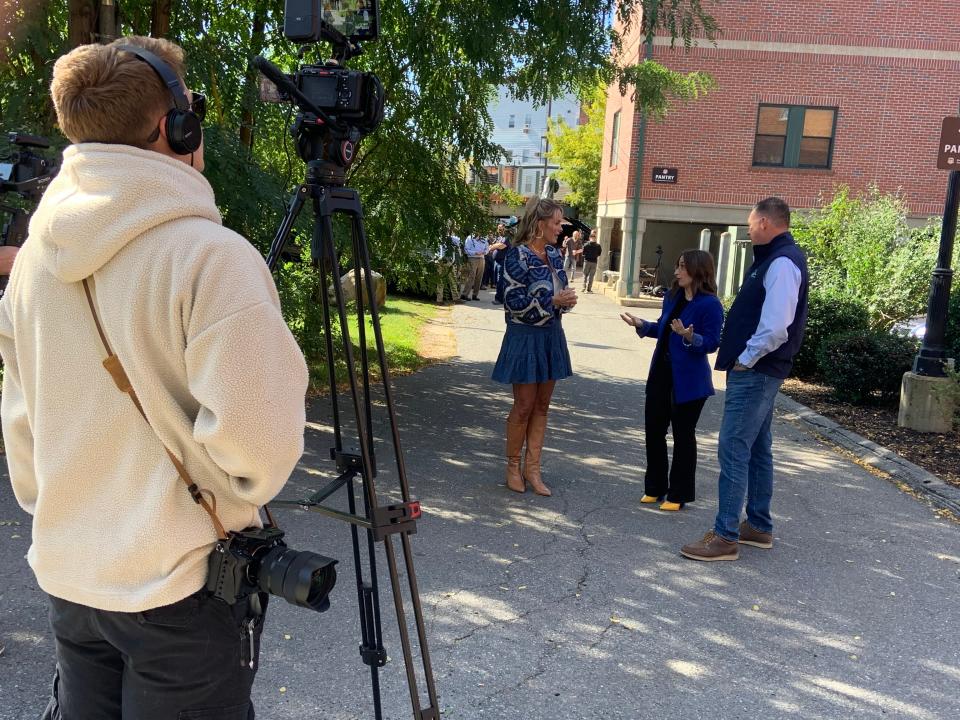 Filming a scene for NBC's "George to the Rescue" at the Montachusett Veterans Outreach Center in Gardner. From left: Jane Barnes, Stephanie Marchetti, and Kevin Barnes.