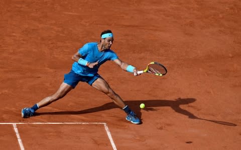 Spain's Rafael Nadal plays a forehand return to Argentina's Juan Martin del Potro during their men's singles semi-final match on day thirteen of The Roland Garros 2018 French Open tennis tournament in Paris on June 8, 2018 - Credit: AFP
