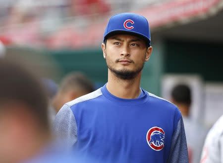 FILE PHOTO: Jun 21, 2018; Cincinnati, OH, USA; Chicago Cubs pitcher Yu Darvish looks on at the beginning of a game against the Cincinnati Reds at Great American Ball Park. Mandatory Credit: David Kohl-USA TODAY Sports