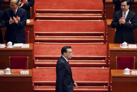 China's Premier Li Keqiang arrives for the closing session of the National People's Congress (NPC) at the Great Hall of the People in Beijing, China, March 16, 2016. REUTERS/Kim Kyung-hoon