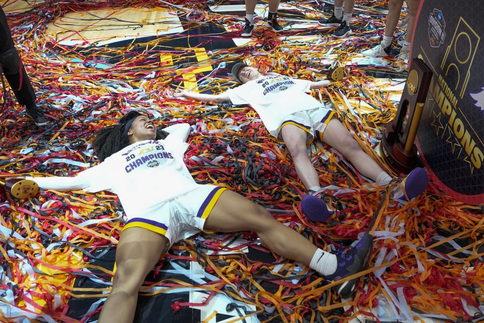 Ashland's Savaya Brockington and Sam Chable celebrate after the NCAA Women's Division 2 championship basketball game against Minnesota Duluth Saturday, April 1, 2023, in Dallas. Ashland won 78-67 to win the championship. (AP Photo/Darron Cummings)