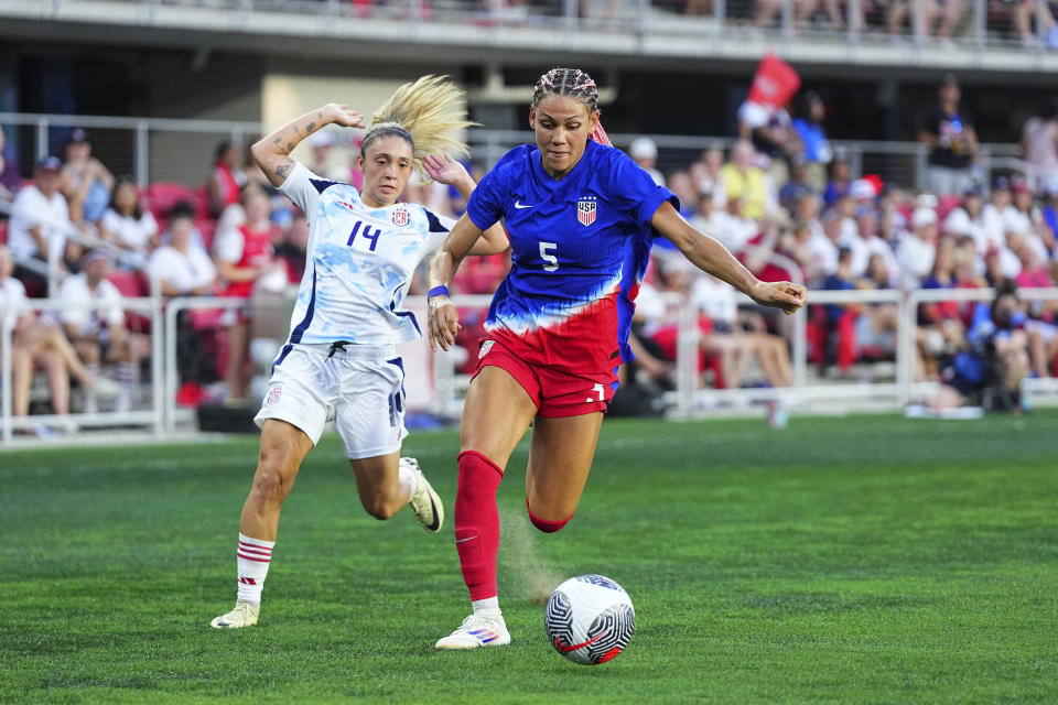 Trinity Rodman controls the ball during the first half.  (Mitchell Leff/Getty Images)