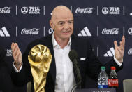 FIFA President Gianni Infantino answers questions during a 2026 soccer World Cup news conference Thursday, June 16, 2022, in New York. (AP Photo/Noah K. Murray)