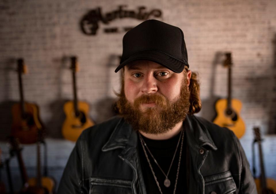 Nate Smith stands for a portrait at Martin Guitars  in Nashville , Tenn., Tuesday, April 11, 2023.