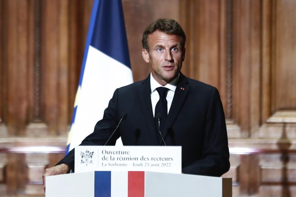 French President Emmanuel Macron delivers a speech at the opening of the back-to-school meeting of rectors, as France is struggling to recruit teachers, Thursday, Aug. 25, 2022, at the Sorbonne University in Paris. Emmanuel Macron will later head to Algeria for a three-day official visit aimed at addressing two major challenges: boosting future economic relations while seeking to heal wounds inherited from the colonial era, 60 years after the North African country won its independence from France. (Mohammed Badra, pool via AP)