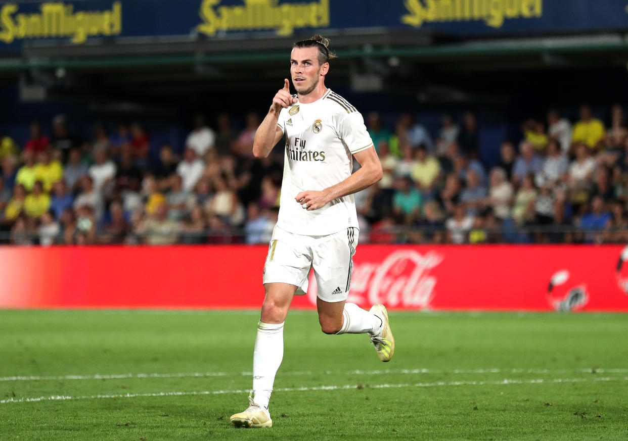 VILLAREAL, SPAIN - SEPTEMBER 01: Gareth Bale of Real Madrid celebrates after scoring his sides first goal during the Liga match between Villarreal CF and Real Madrid CF at Estadio de la Ceramica on September 01, 2019 in Villareal, Spain. (Photo by David Ramos/Getty Images)