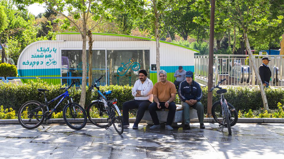 People walk on the streets and as they continue their daily lives after the news of the attacks in Isfahan, Iran on Friday. - Anadolu/Getty Images