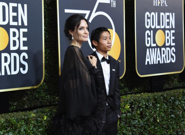 Angelina Jolie hit the red carpet of the 2018 Golden Globes with her 14-year-old son, Pax.