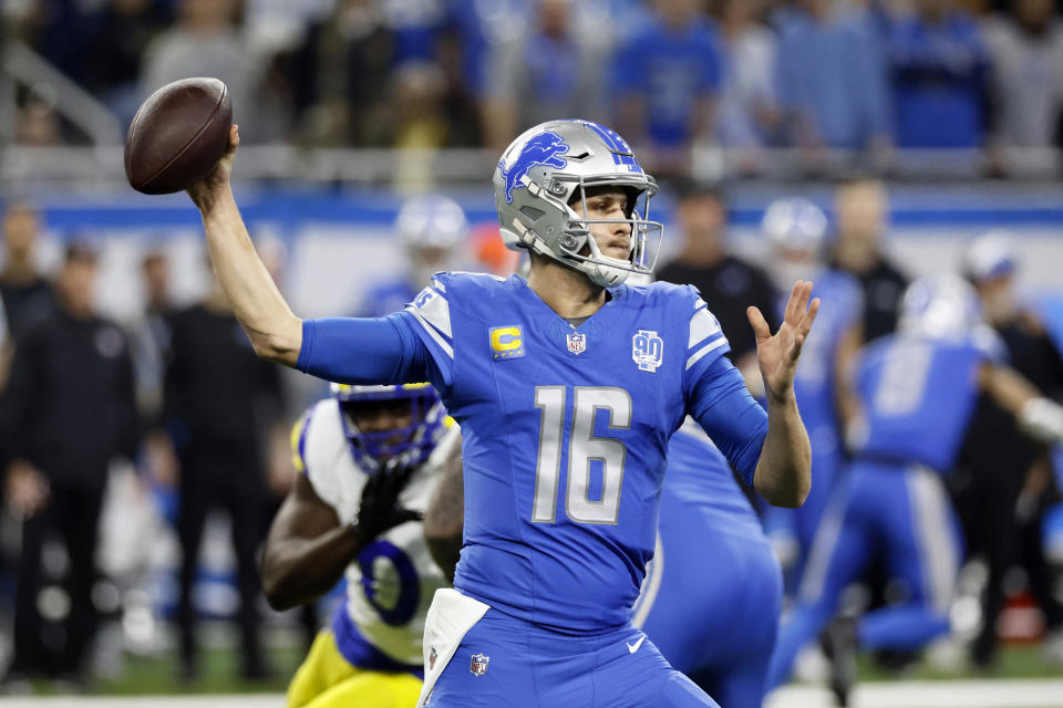 Detroit Lions quarterback Jared Goff throws during the first half of an NFL wild-card playoff football game against the Los Angeles Rams, Sunday, Jan. 14, 2024, in Detroit. (AP Photo/Duane Burleson)