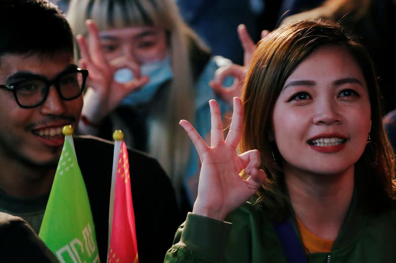 Supporters of Taiwan President Tsai Ing-wen celebrate the preliminary results at a rally outside the Democratic Progressive Party (DPP) headquarters in Taipei