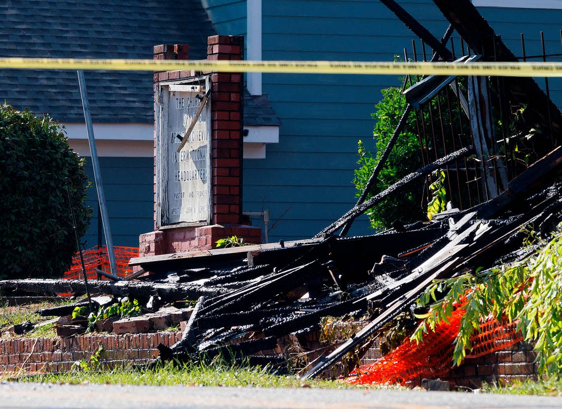 The remains of fire at a building near the intersection of East Main Street and Holman Street are seen on Thursday, May 2, 2024, in Durham, N.C.