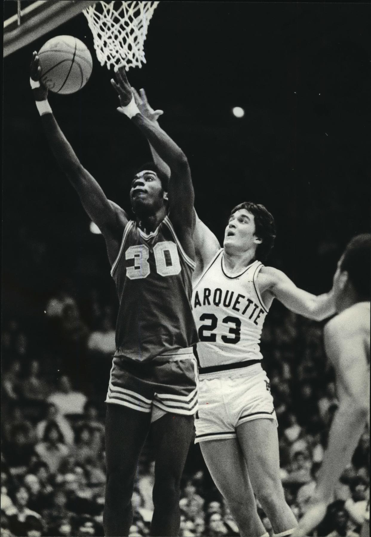 Thomas More star Nigel Wallace plays in the 1980 WISAA championship game against Marquette.