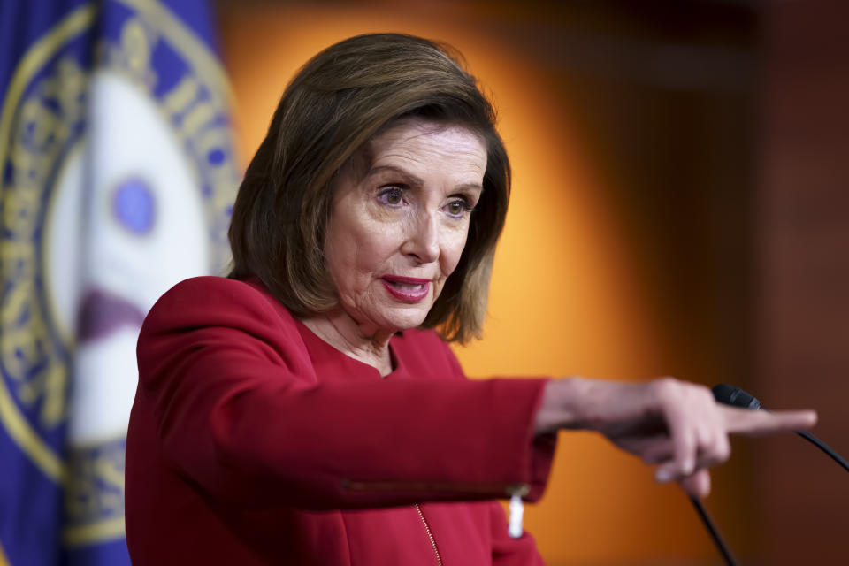 In this Sept. 8, 2021 photo, Speaker of the House Nancy Pelosi, D-Calif., meets with reporters to discuss President Joe Biden's domestic agenda at the Capitol in Washington. House Democrats are unveiling a sweeping proposal for tax hikes on big corporations and the wealthy to fund President Joe Biden’s $3.5 trillion rebuilding plan. The House released details on Monday as Congress speeds ahead to shape the far-reaching package touches almost all aspects of domestic life. (AP Photo/J. Scott Applewhite)