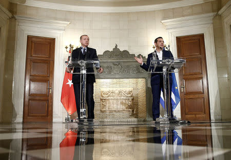 Greek Prime Minister Alexis Tsipras and Turkish President Tayyip Erdogan attend a press conference following their meeting at the Maximos Mansion in Athens, Greece December 7, 2017. REUTERS/Costas Baltas