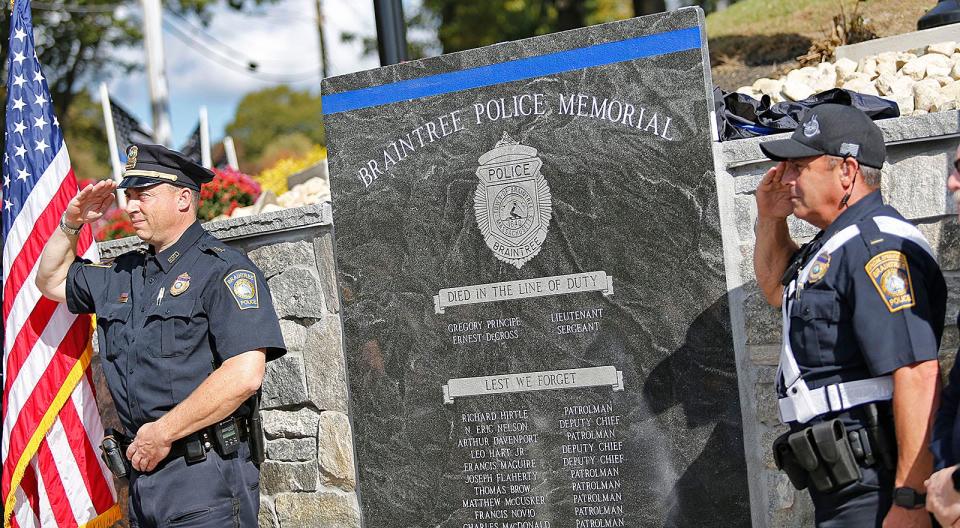 The rededicated Braintree Police Officers Memorial was unveiled during a ceremony to dedicate a statue of K-9 Kitt and rededicate the memorial at the Union Street station on Thursday, Oct. 19, 2023.