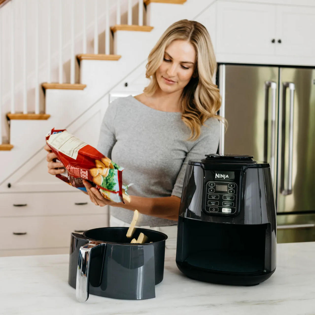 The air fryer can cook up to 50% faster than a fan oven. (Ninja)