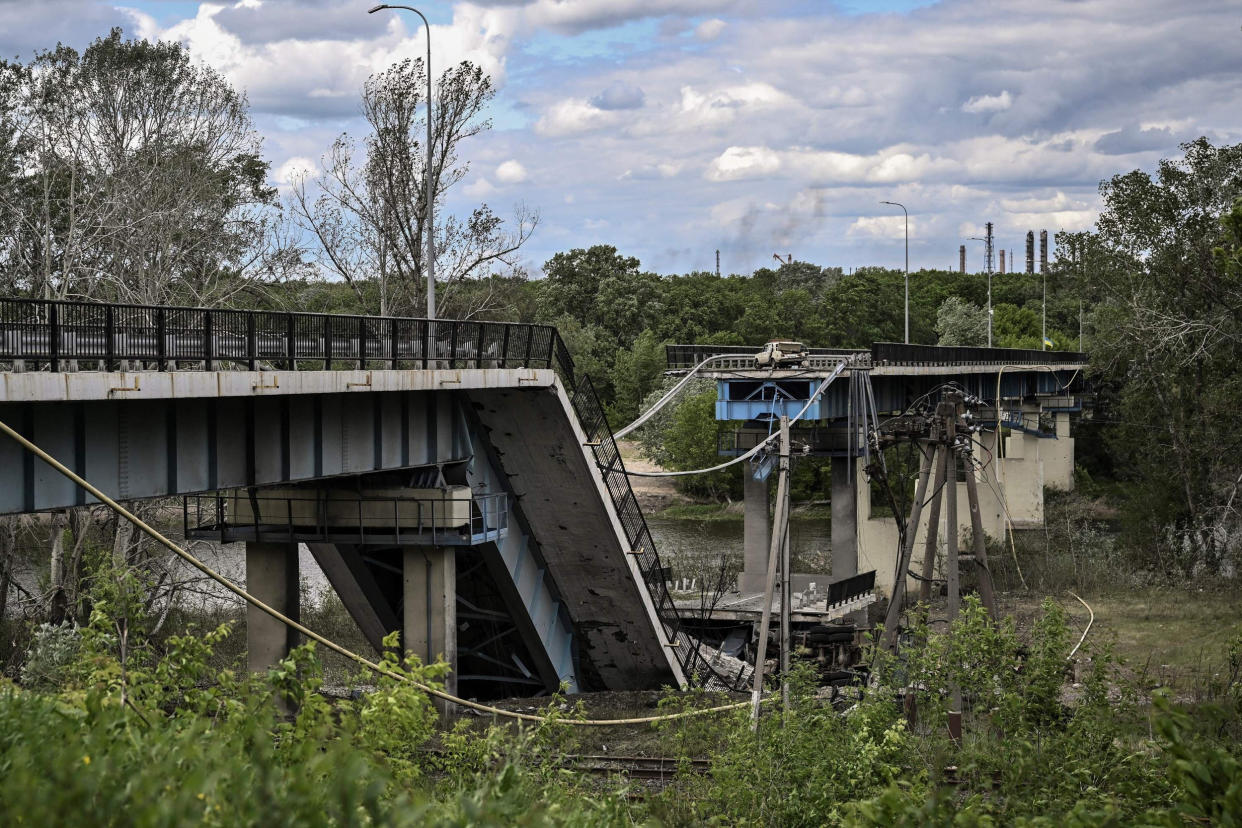 The destroyed bridge connecting the city of Lysychansk with the city of Severodonetsk in the eastern Ukranian region of Donbas on May 22, 2022. (Aris Messinis / AFP - Getty Images)