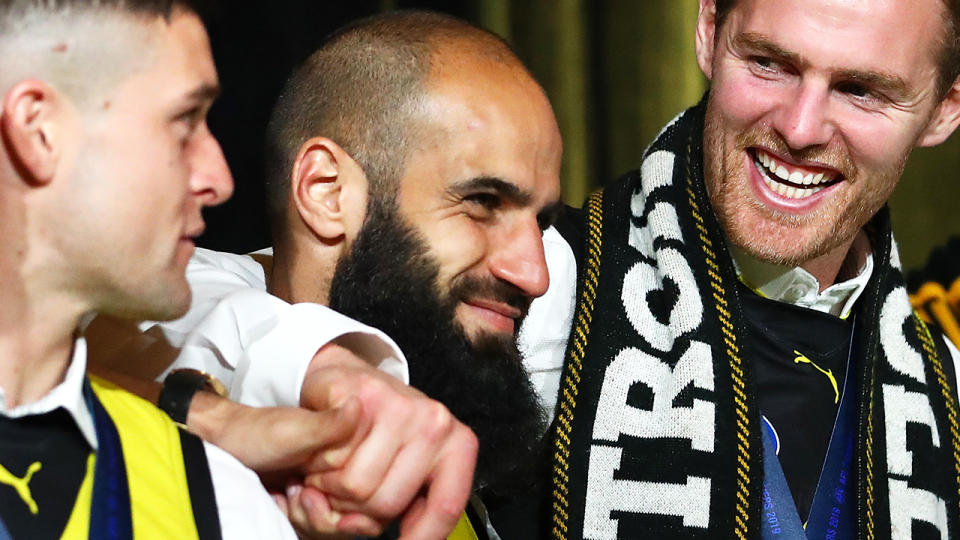 Richmond star Bachar Houli, pictured after the Tigers won the AFL Grand Final, returned to the MCG on Sunday to coach a youth team.