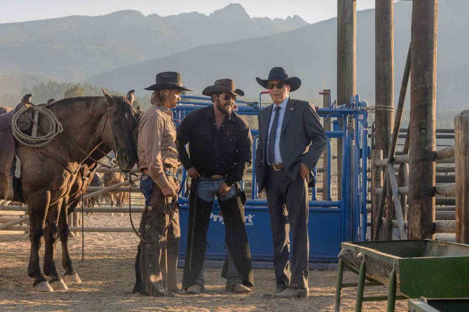 <p>Paramount+</p> Luke Grimes, Cole Hauser, and Kevin Costner on the set of 