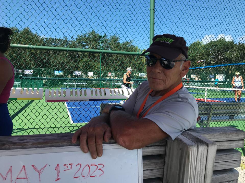 Bob Dini, 73, of Vero Beach oversaw pickle ball games at the Pocahontas Park courts Friday as Brightline trains carrying passengers rolled through for the first time. He said he had “no objections” to the trains but would like to see a station built nearby.