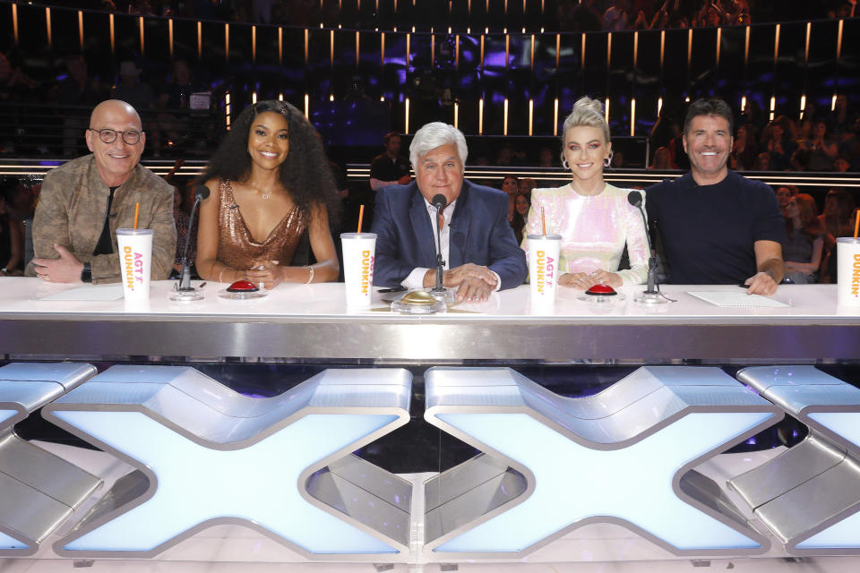 AMERICA'S GOT TALENT -- "Judge Cuts" -- Pictured: (l-r) Howie Mandel, Gabrielle Union, Jay Leno, Julianne Hough, Simon Cowell -- (Photo by: Trae Patton/NBCU Photo Bank/NBCUniversal via Getty Images via Getty Images)