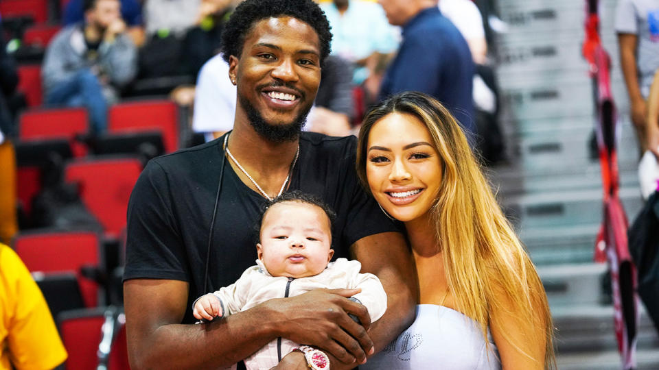 Malik Beasley, pictured here with Montana Yao and their son Makai in 2019.