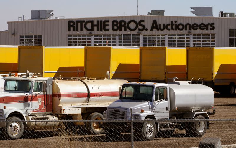 FILE PHOTO: Vehicles to be sold in the next auction are lined up outside Ritchie Bros. Auctioneers in Longmont