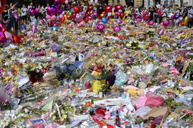 Floral Tributes Are Left For The Victims Of The Manchester Arena Terrorist Attack - Credit:  Anthony Devlin/Getty Images