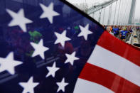 Runners cross the Verrazano-Narrows Bridge shortly after the start of the New York City Marathon in New York, U.S., November 5, 2017. REUTERS/Lucas Jackson