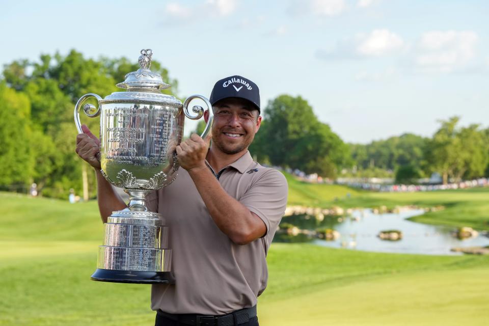 Xander Schauffele celebrates after winning the PGA Championship at Valhalla Golf Club in Louisville, Kentucky on May 19, 2024.