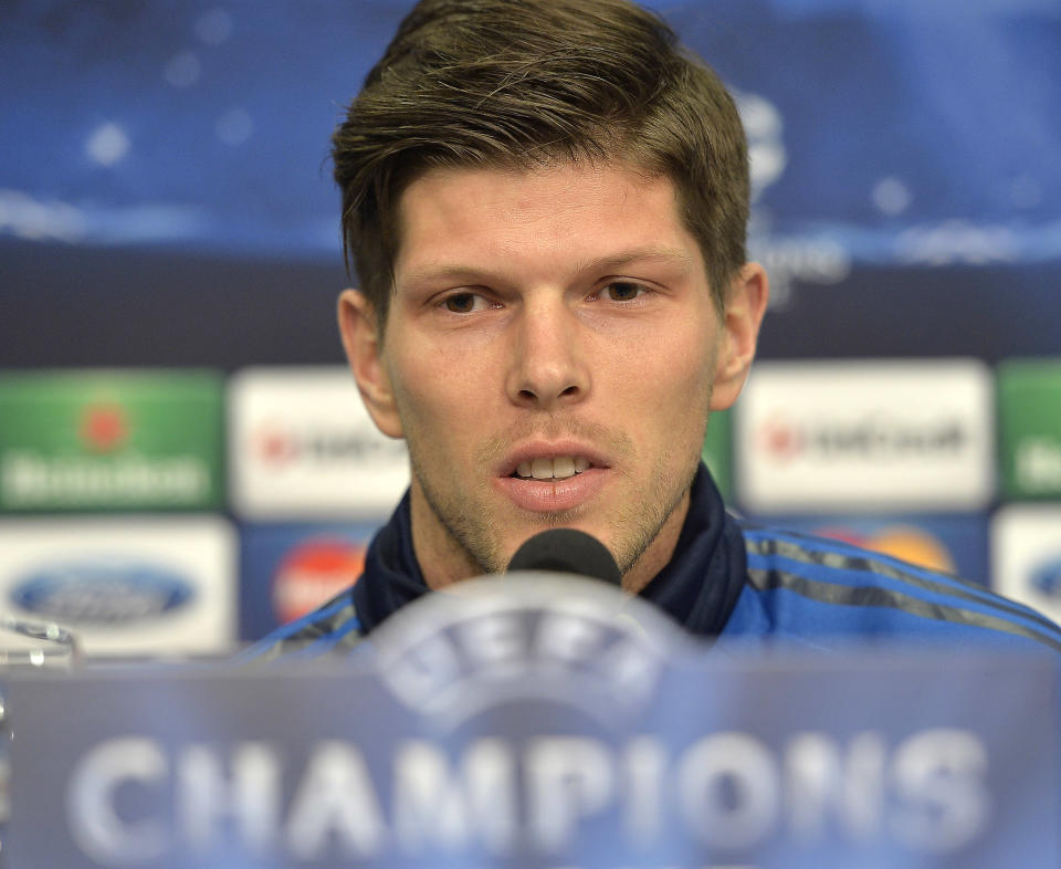 Schalke's forward Klaas-Jan Huntelaar of the Netherlands talks to the media during a press conference prior to the UEFA Champions League first leg knock out soccer match between FC Schalke 04 and Real Madrid in Gelsenkirchen, Tuesday, Feb. 25, 2014. (AP Photo/Martin Meissner)