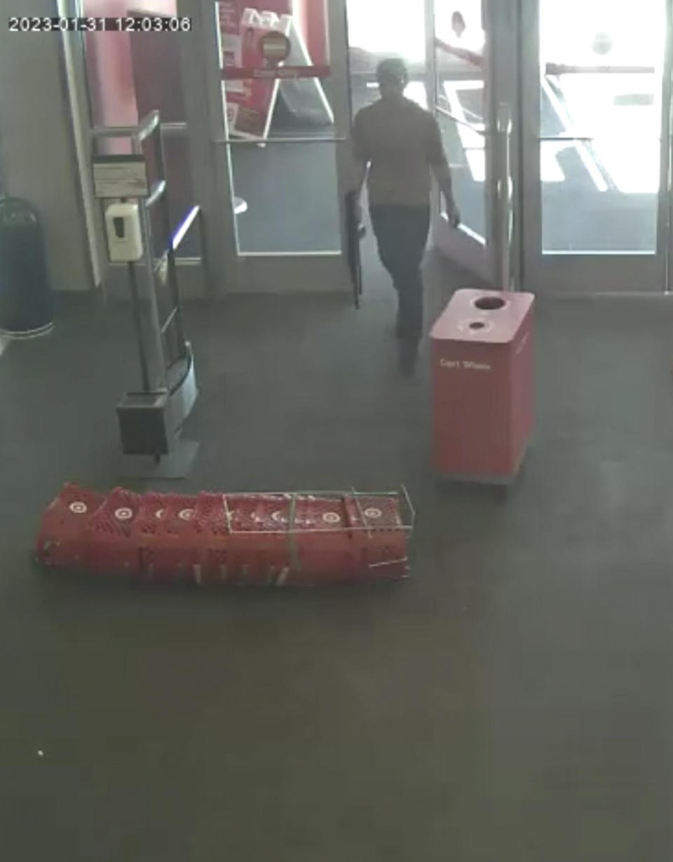 In this image take from security camera footage provided by the Omaha, Neb., Police Department, a man identified by police as Joseph Jones, armed with an AR-15-style rifle, walks inside a Target store in Omaha on Tuesday, Jan. 31, 2023, before police fatally shot him. On Wednesday, Feb. 1, police said that Jones obtained the weapon just four day earlier at a Cabela’s sporting goods store. (Omaha Police Department via AP)