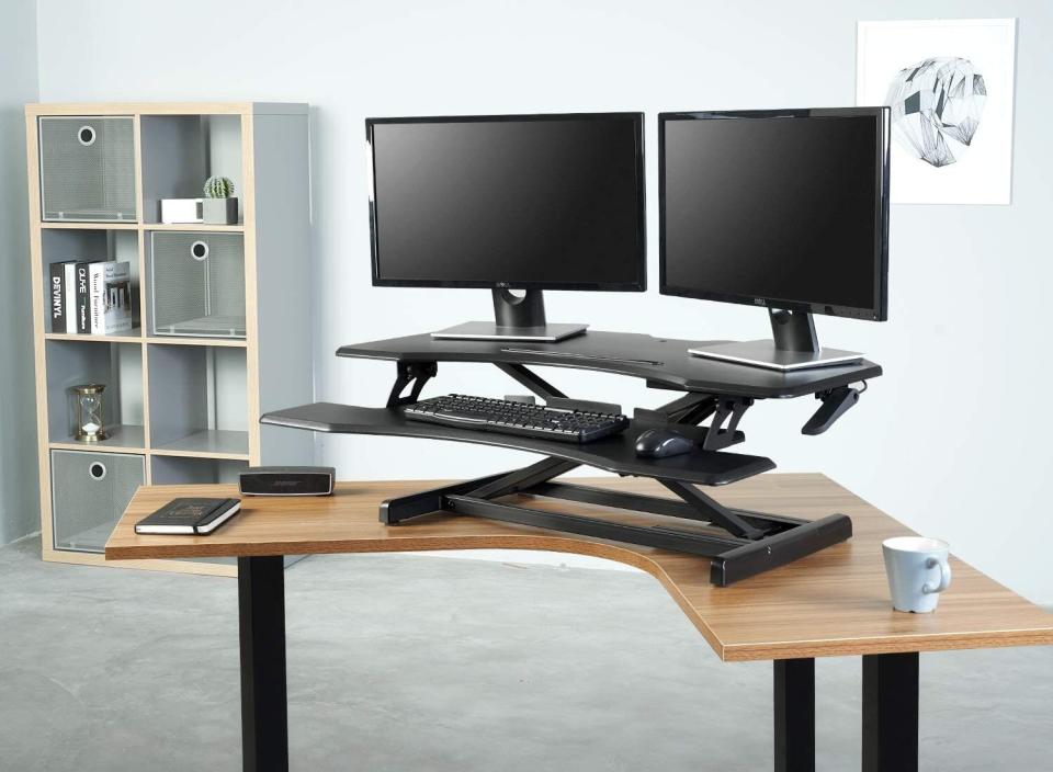 Find this <a href="https://amzn.to/2WWI6BX" target="_blank" rel="noopener noreferrer">standing desk with adjustable height</a> for $165 at <a href="https://amzn.to/2WWI6BX" target="_blank" rel="noopener noreferrer">Amazon</a>.<br /><strong>Ratings</strong>: 4.6 stars<br /><strong>Reviews</strong>: More than 300