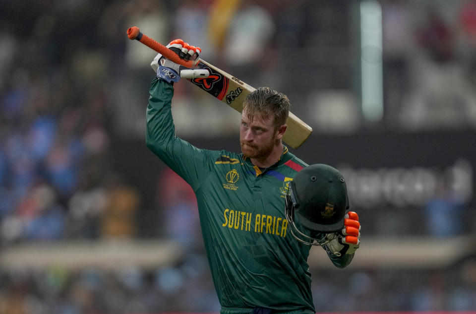 South Africa's Heinrich Klaasen acknowledges the crowd as he leaves the field after losing his wicket during the ICC Men's Cricket World Cup match between South Africa and England in Mumbai, India, Saturday, Oct. 21, 2023. (AP Photo/ Rafiq Maqbool)